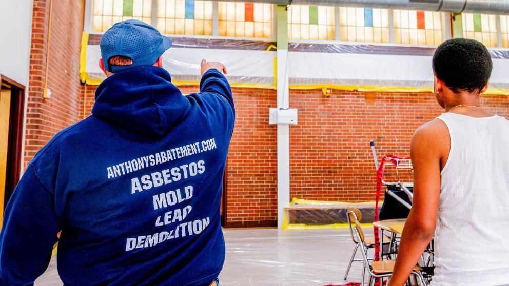 inspecting potential home for asbestos