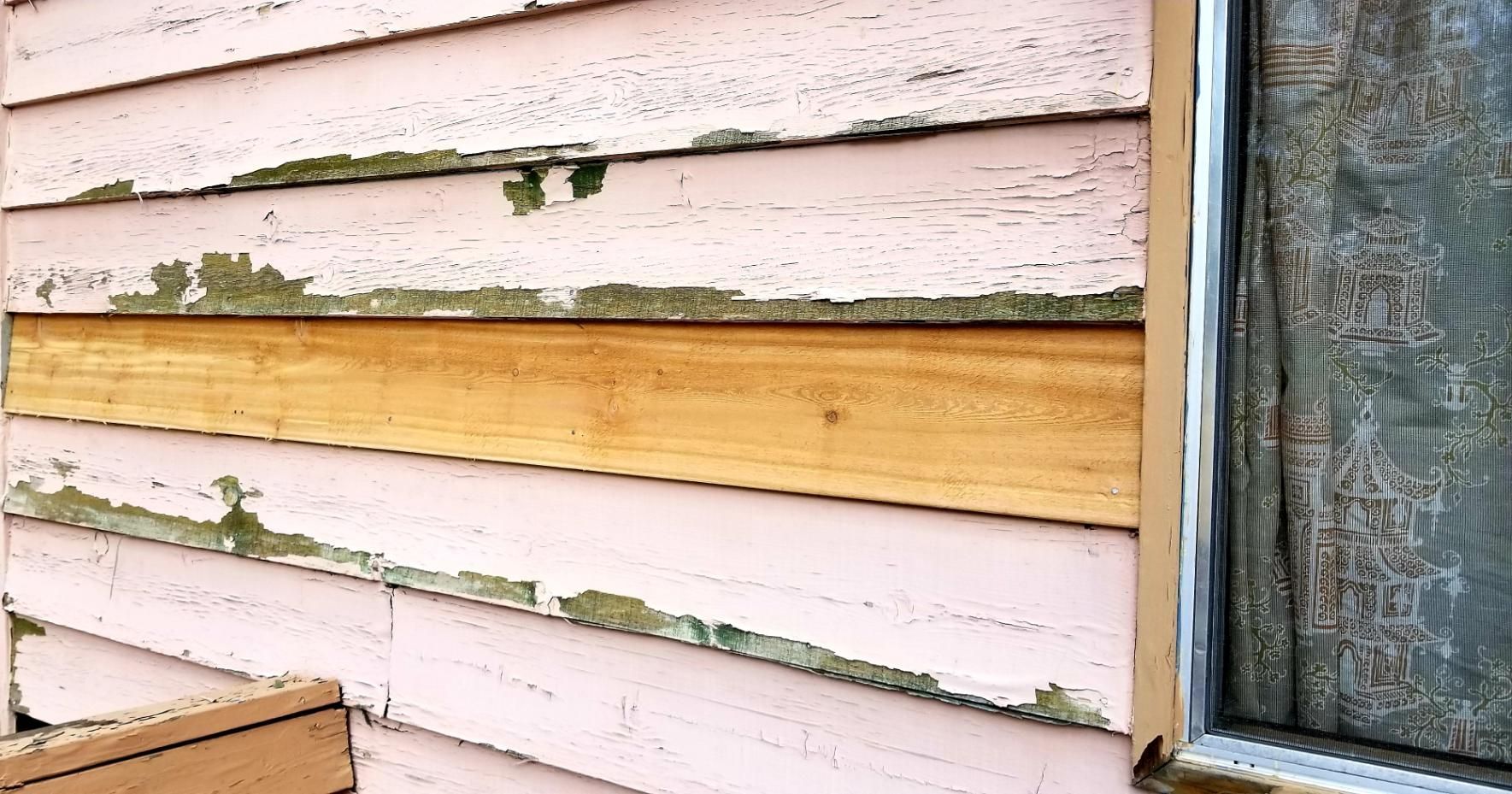 house exterior with asbestos siding