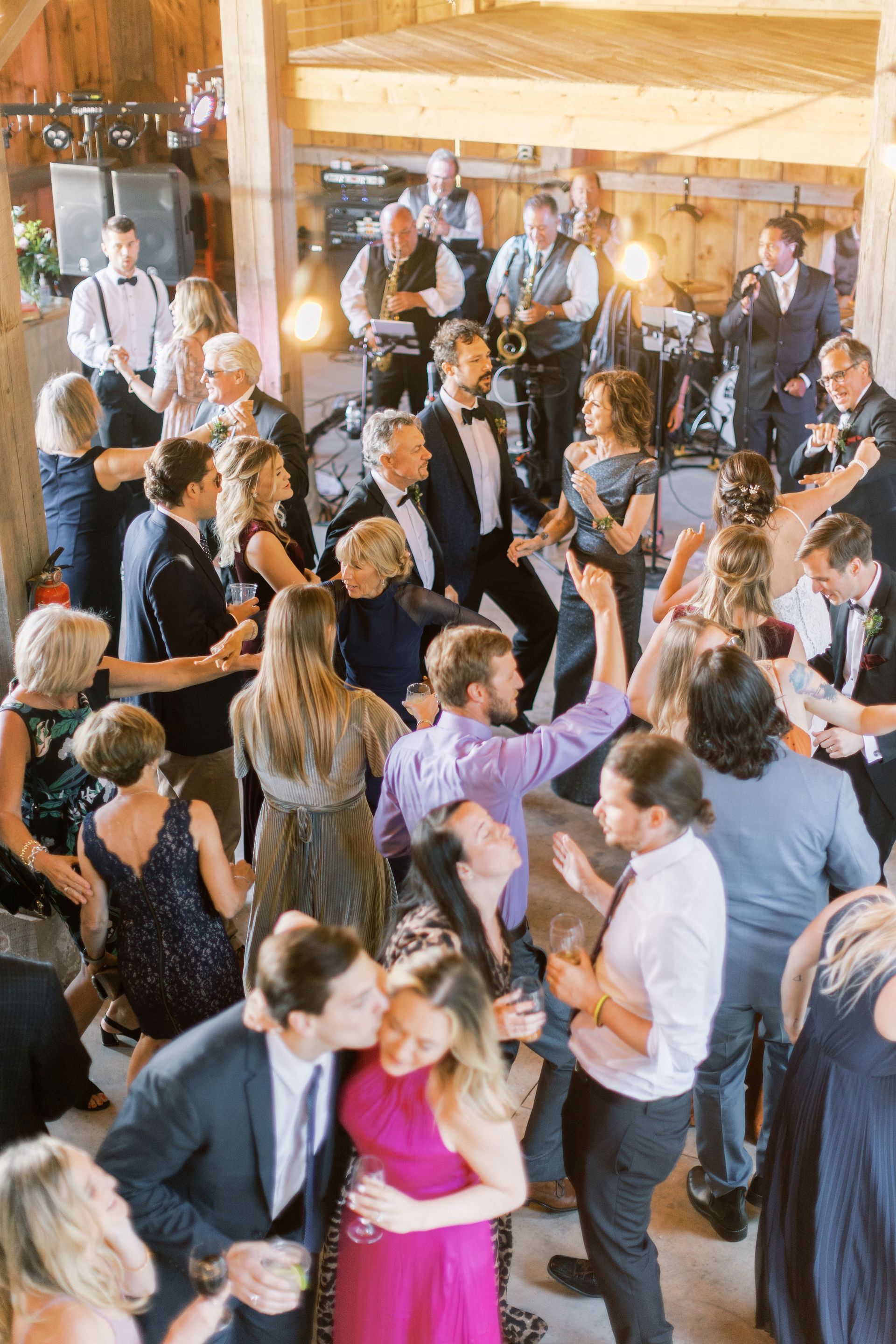 A stunning overhead photo during an outdoor barn wedding featuring the music by Mainstreet Soul
