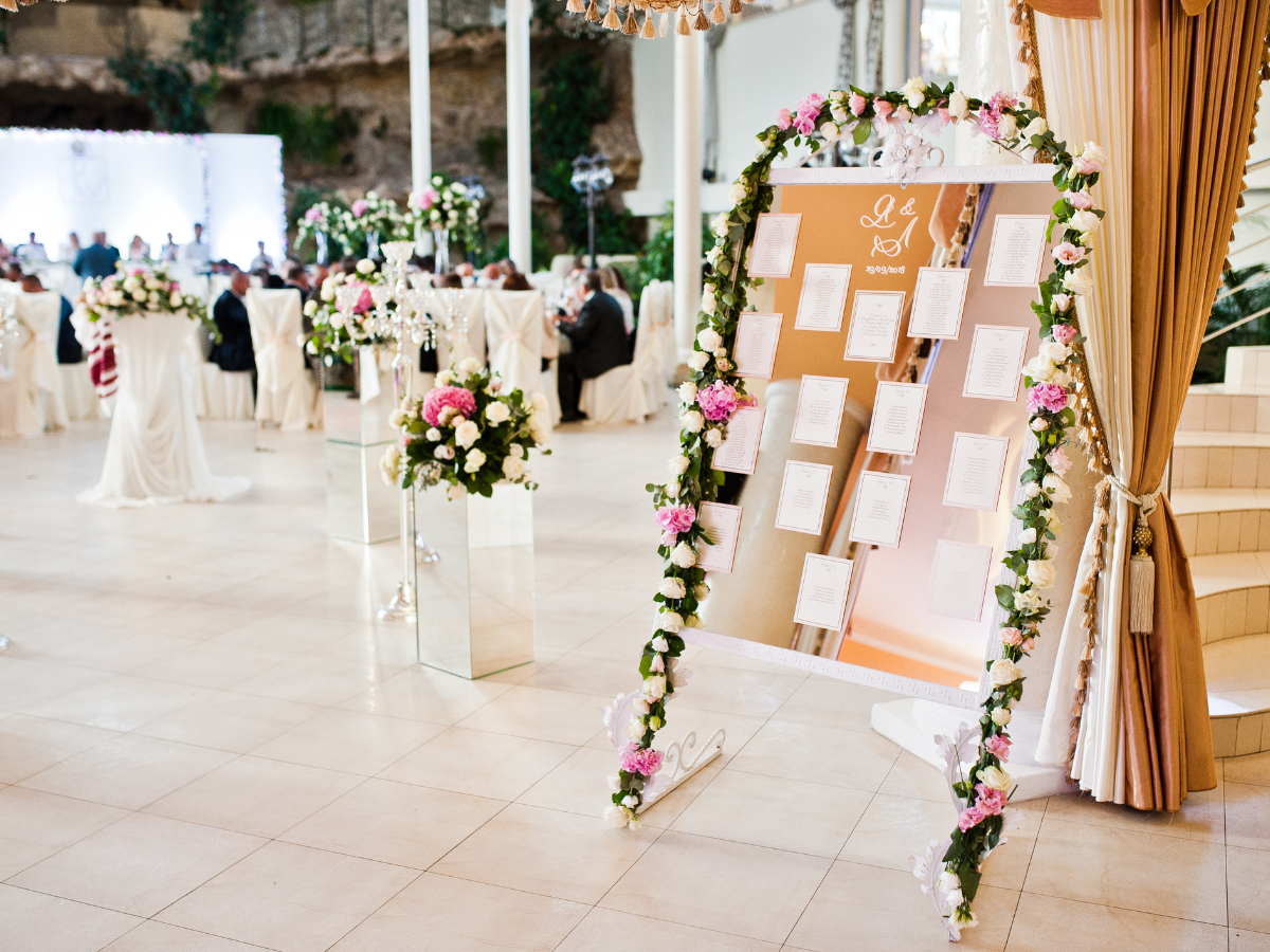 a wedding seating chart with the initials of the bride and groom on it
