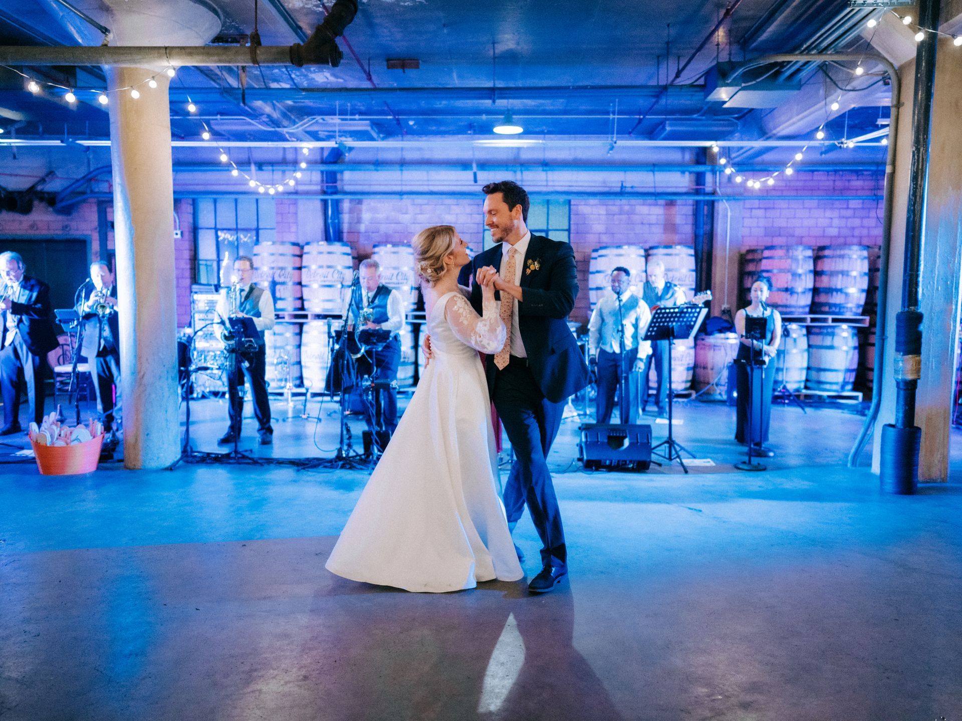 a bride and groom are dancing at their wedding reception