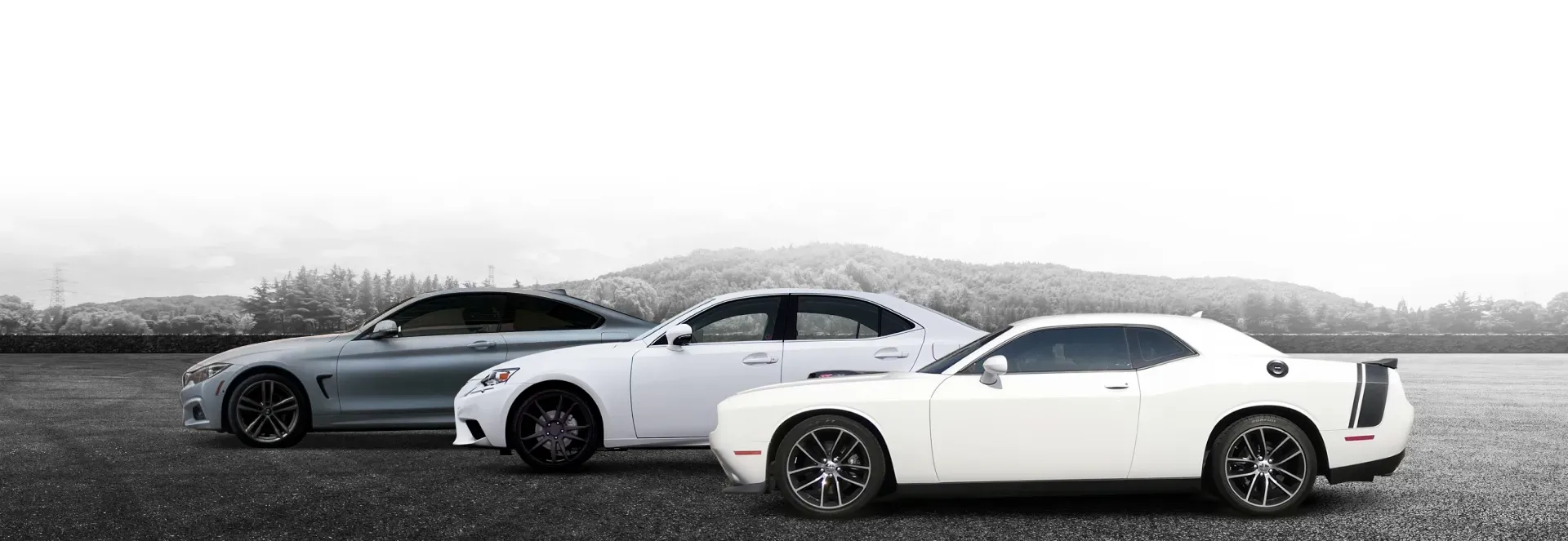 Three vehicles parked near each other | After Hours Tires