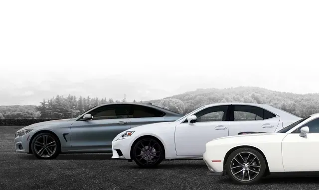 Three vehicles parked near each other | After Hours Tires