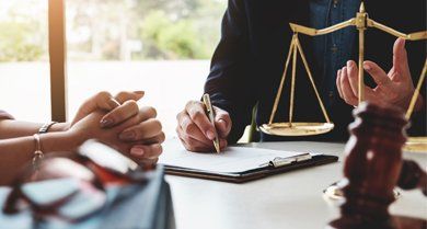 Attorney — Lawyer and a Client with Scale and Gavel in Schuylerville, NY Attorney — Lawyer and a Client with Scale and Gavel in Schuylerville, NY