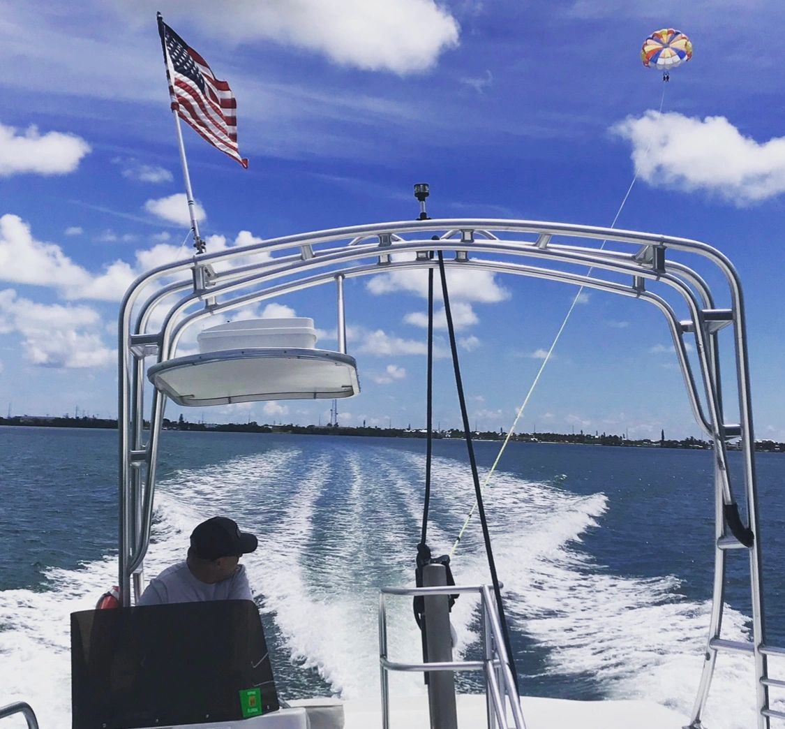 A boat with an american flag on top of it