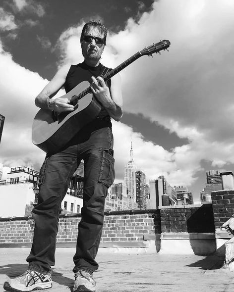 Matt Feinberg playing guitar