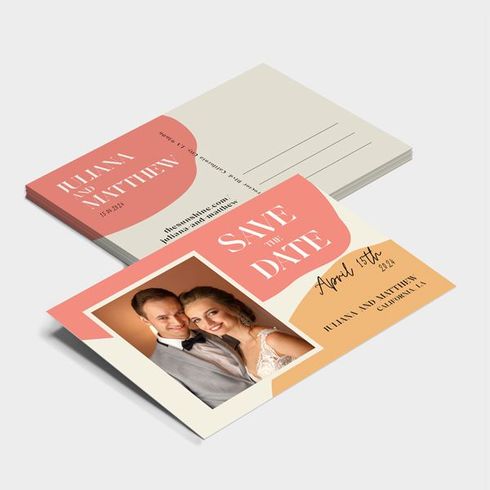 A save the date card with a picture of a bride and groom