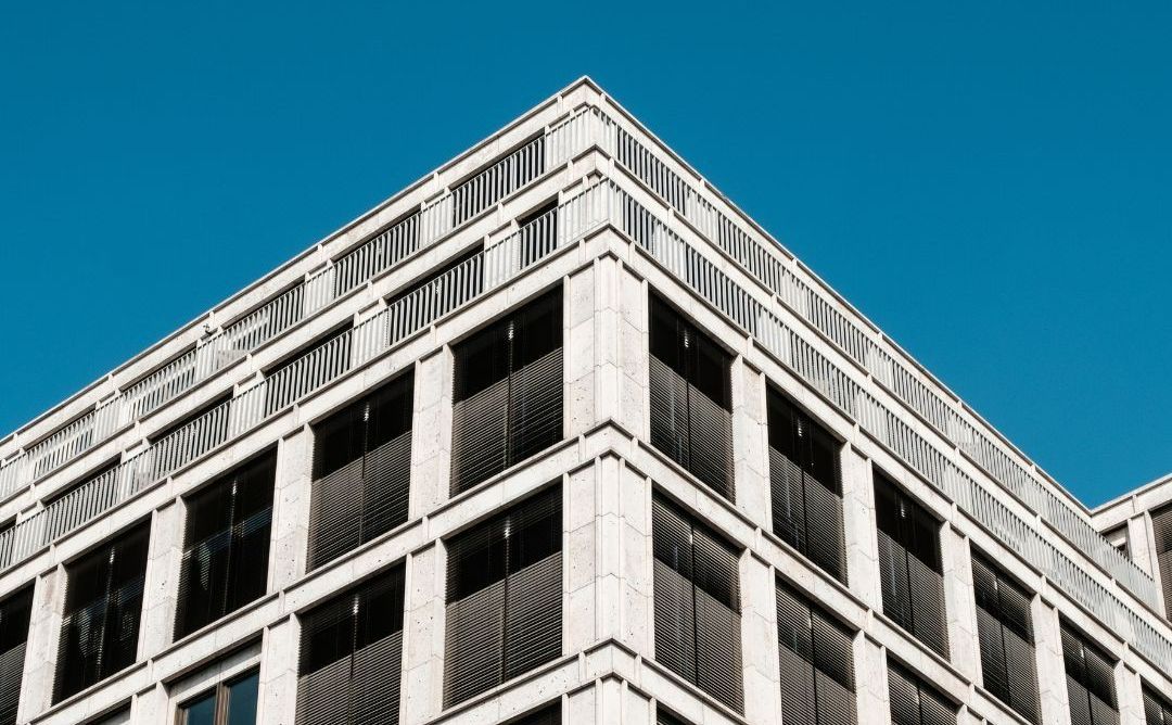 A Black And White Photo Of The Corner Of A Building With A Blue Sky In The Background — North Ballina Windows In Ballina, NSW