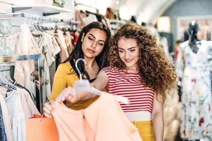 Two ladies choosing clothes — Hudsonville, MI — BeYOUtiful Image Consulting