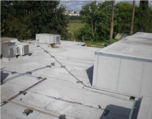 Shop Roof with Pipe — Houston, TX — Ranger Roofing
