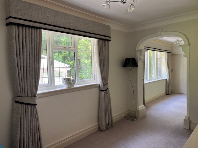 Linen curtains with flat double border pelmet and matching tie backs