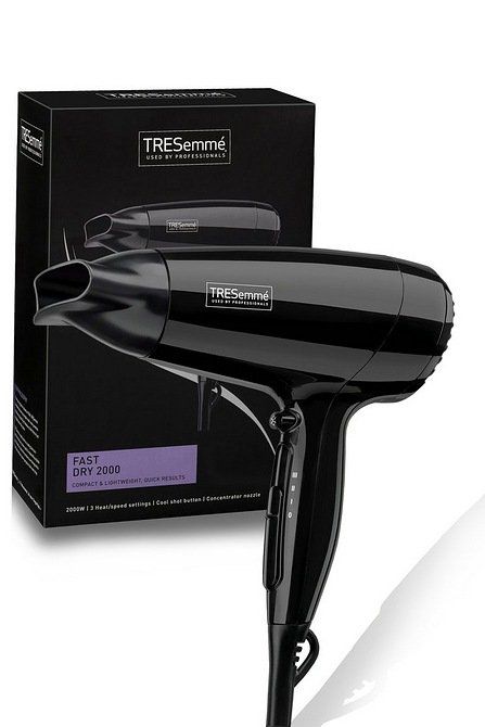 A black hair dryer is sitting next to a box.