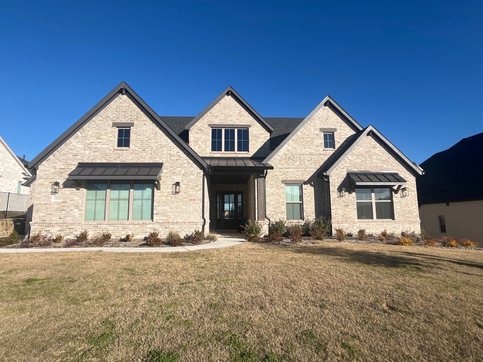 Large Brown Brick Home