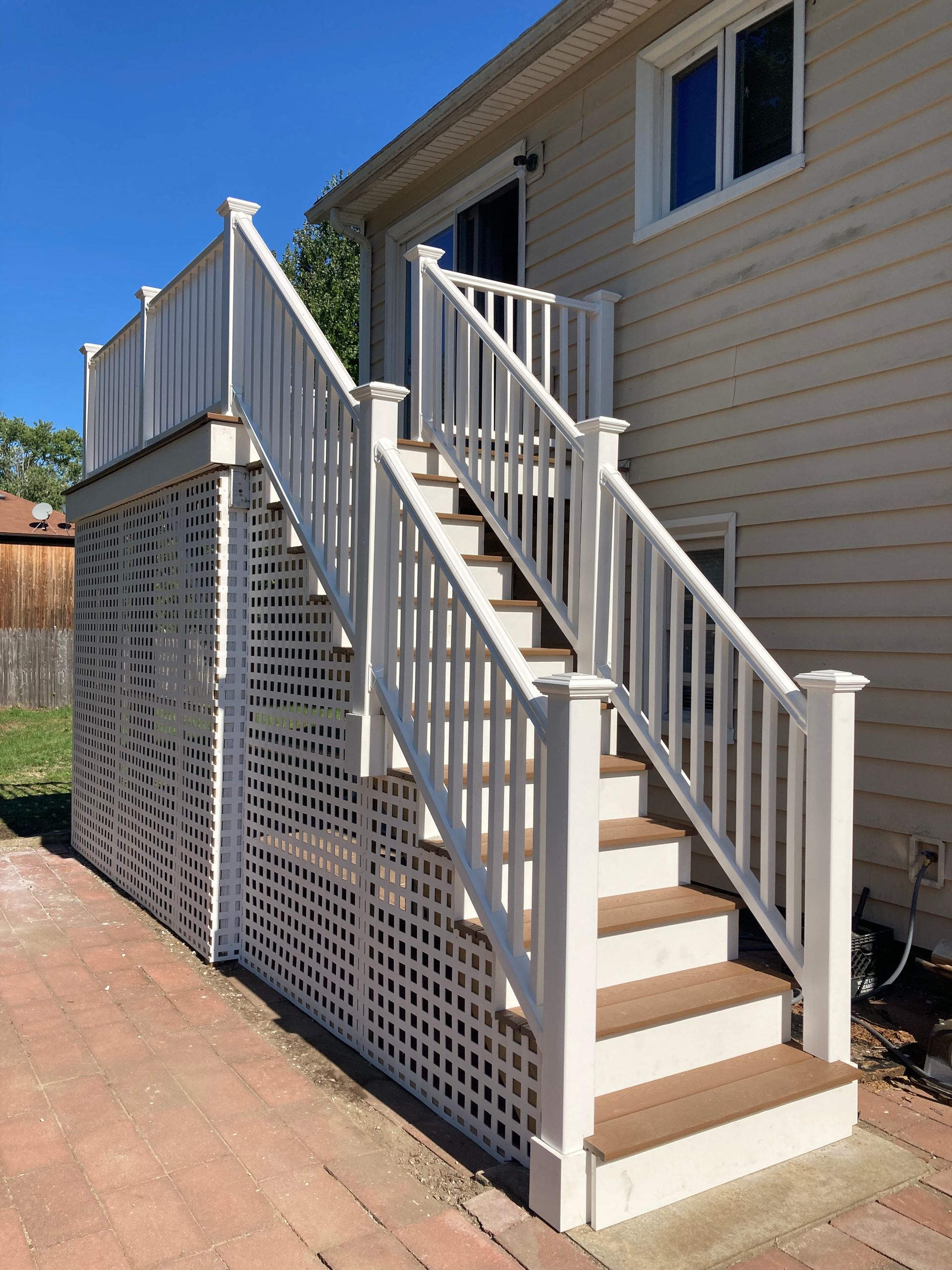 outside staircase leading up to a deck