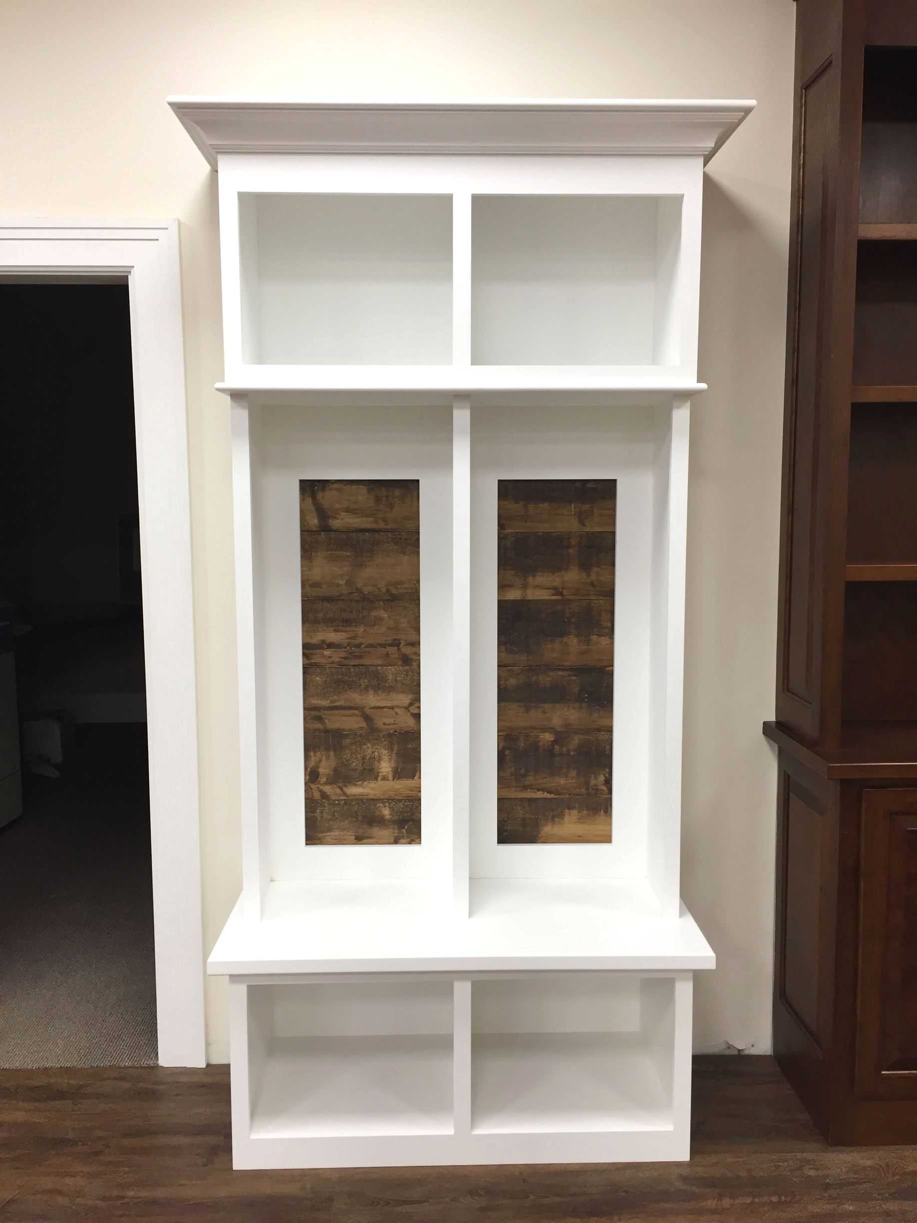 white shelf for shoes and coats
