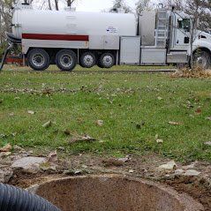 Vacuuming Pothole - Cedar Rapids, IA - Roto Rooter Sewer & Drain Cleaning