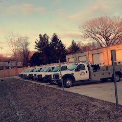 Row of Roto Rooter Trucks - Cedar Rapids, IA - Roto Rooter Sewer & Drain Cleaning