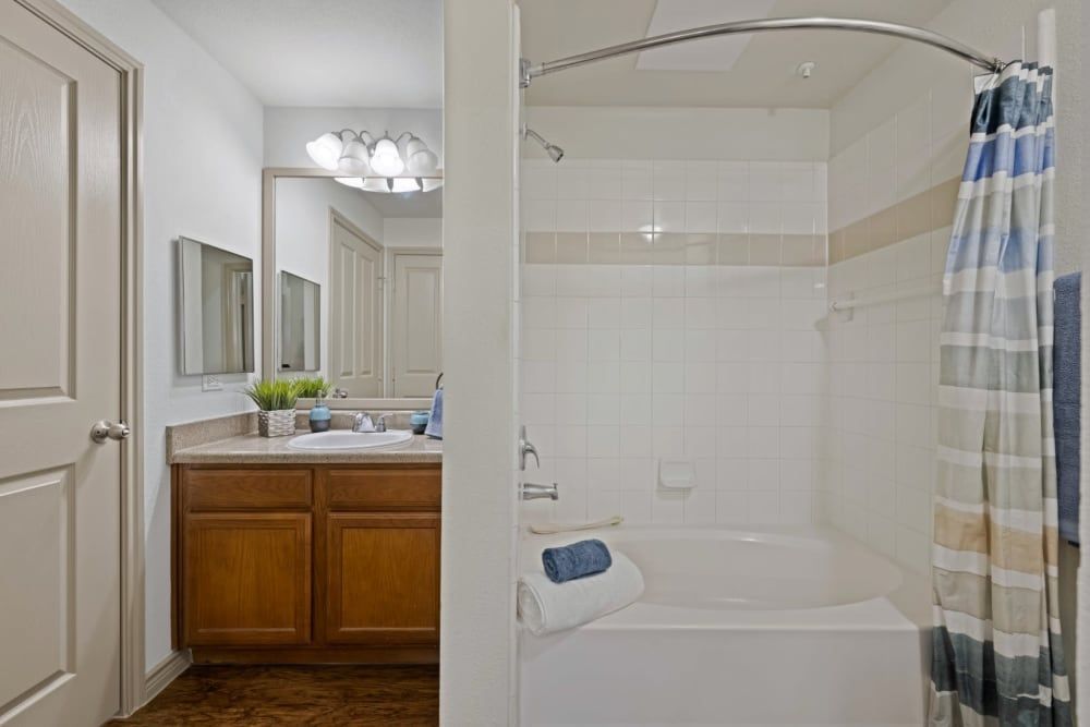 Modern Bathroom with Bathtub at The Marquis at Brushy Creek