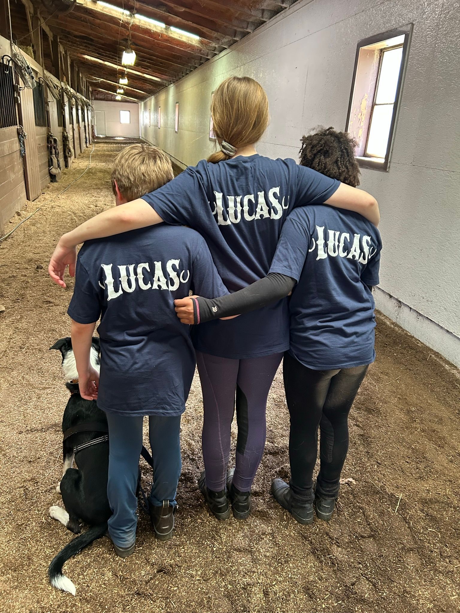 3 people with the word LUCAS on their back