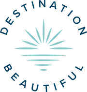 The logo for destination beautiful shows a sun shining over a body of water.