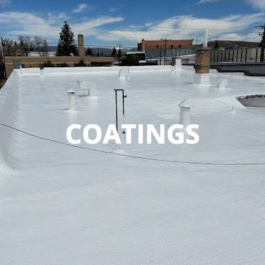 A white roof with the words `` coatings '' written on it.