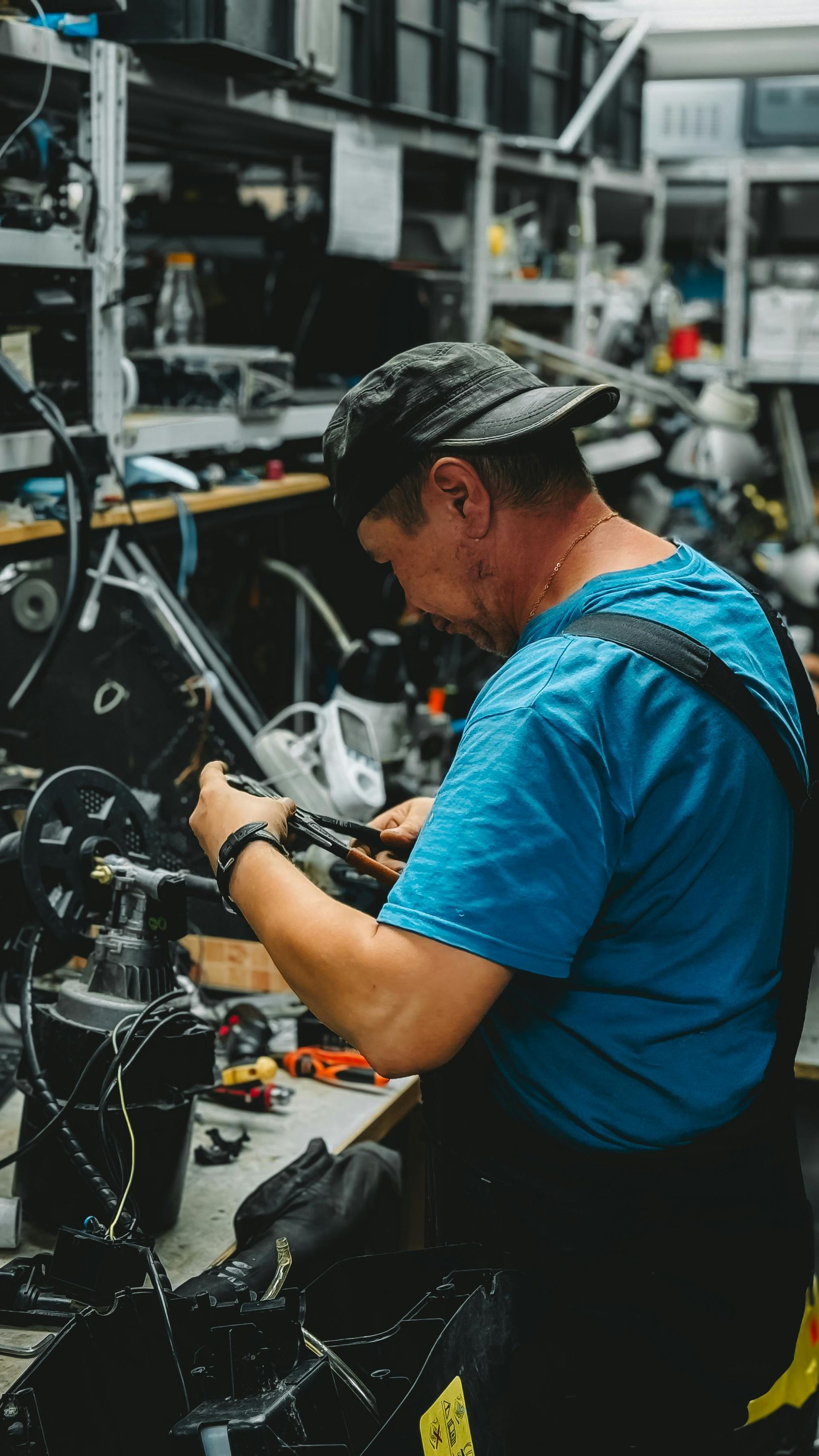 Manufacturing workers operating machinery in an industrial facility