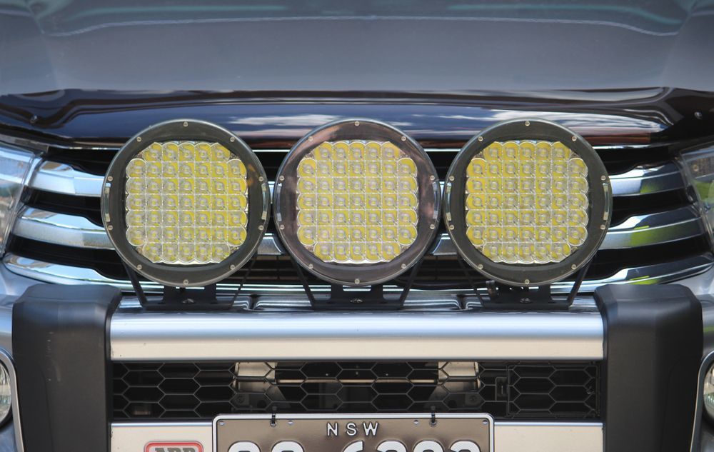 A Close Up Of The Front Of A Car With Three Lights On It — Maitland 4WD Centre In Singleton, NSW