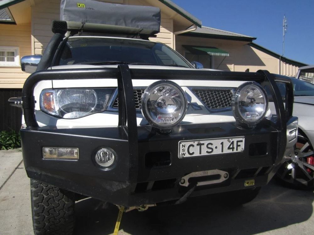 A White Truck With A License Plate And Bull Bars — Maitland 4WD Centre In Maitland, NSW