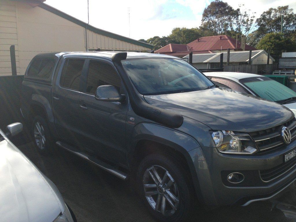 A Pickup Truck Is Parked In A Parking Lot — Maitland 4WD Centre In Maitland, NSW