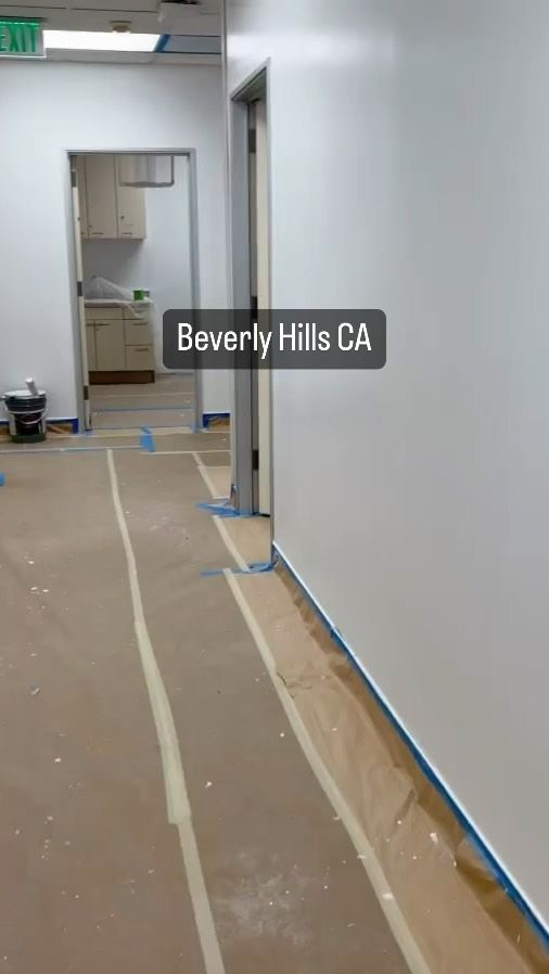 A hallway with a sign that says beverly hills ca