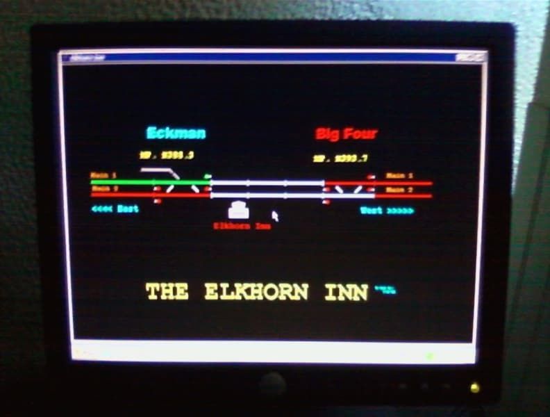 A computer monitor displays a game called the elkhorn inn