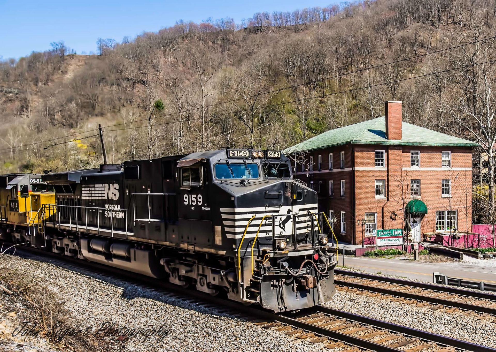A train with the number 355 on the front of it