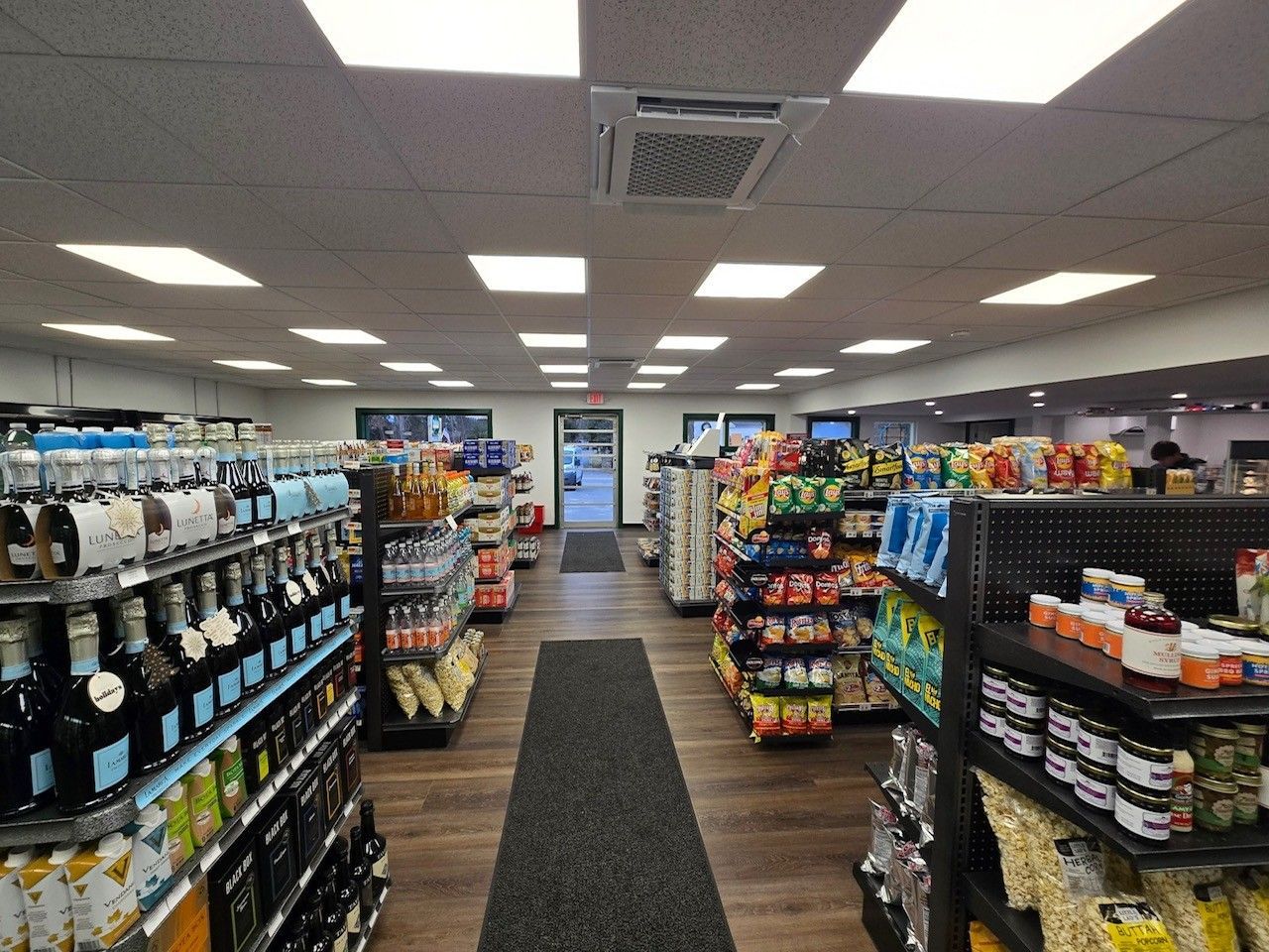 The inside of a grocery store filled with lots of products.