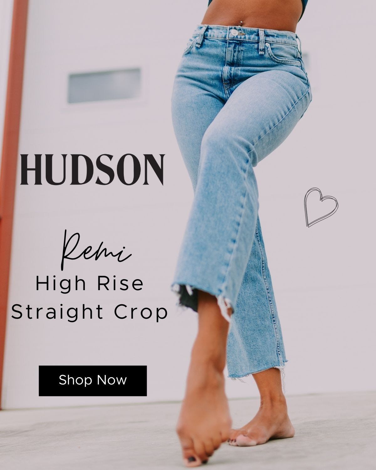 A woman is wearing a pair of high rise straight crop jeans