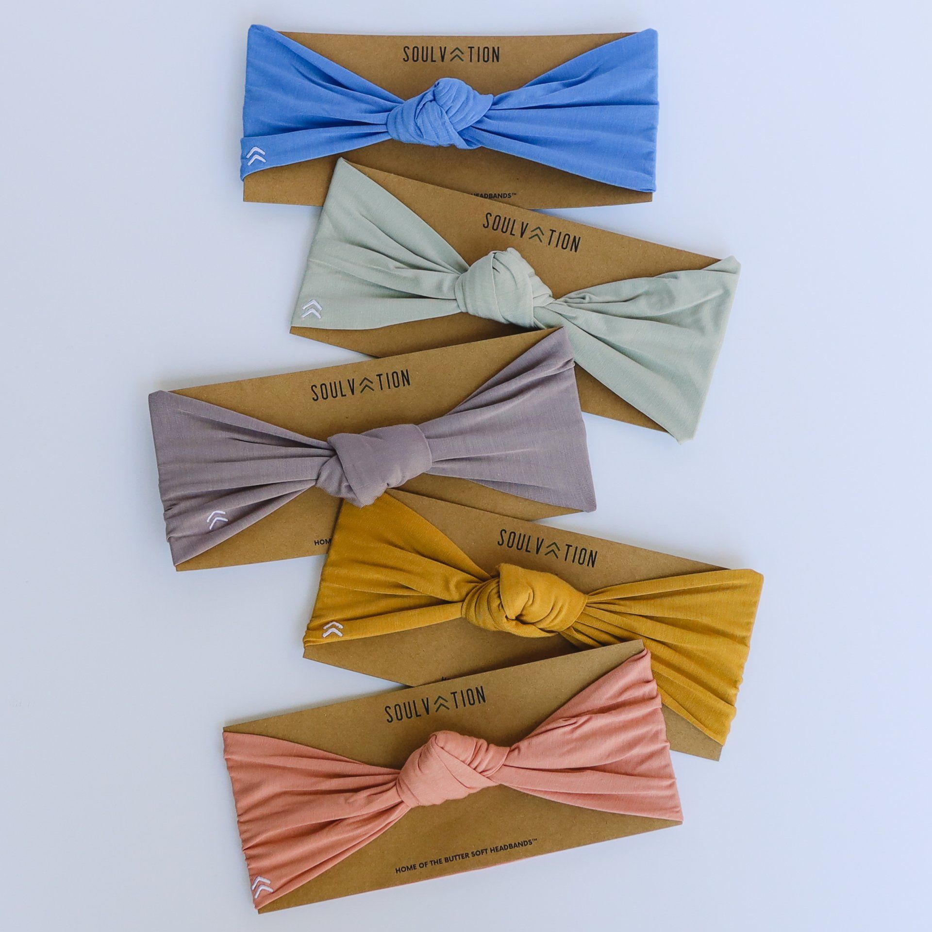 A bunch of headbands are stacked on top of each other