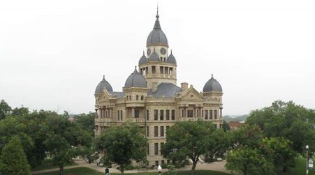 A large building with a clock tower on top of it