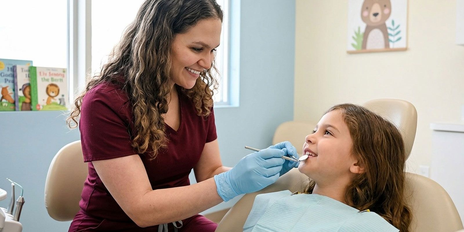 Periodontist for Children Dr. Stephanie Sfiroudis DDS, MS, treating a young girl