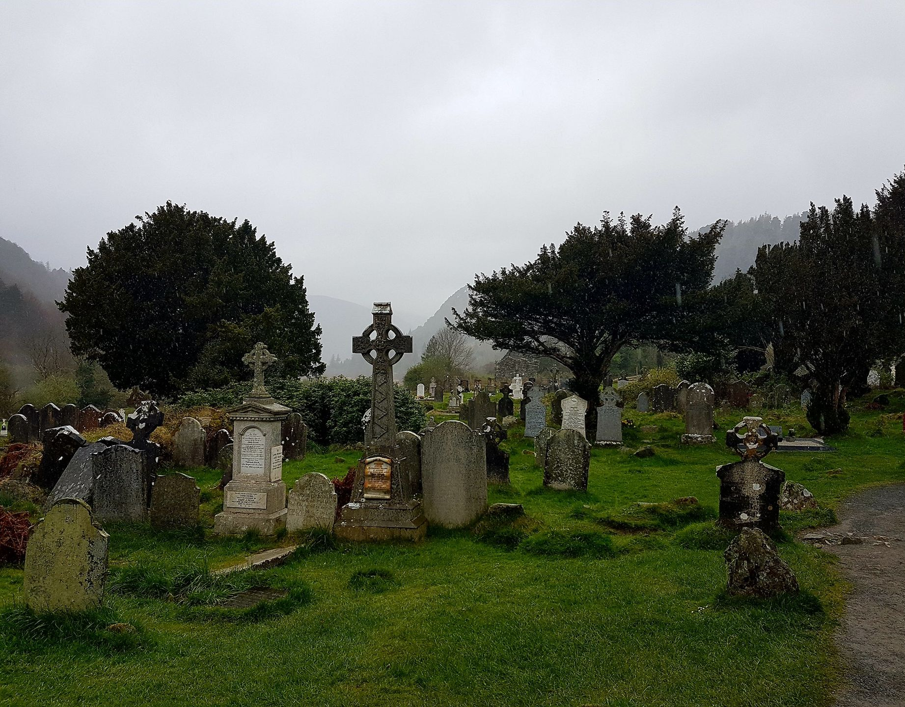 Ancient Irish cemetery at twilight where banshee legends were born, County Kerry folklore travel