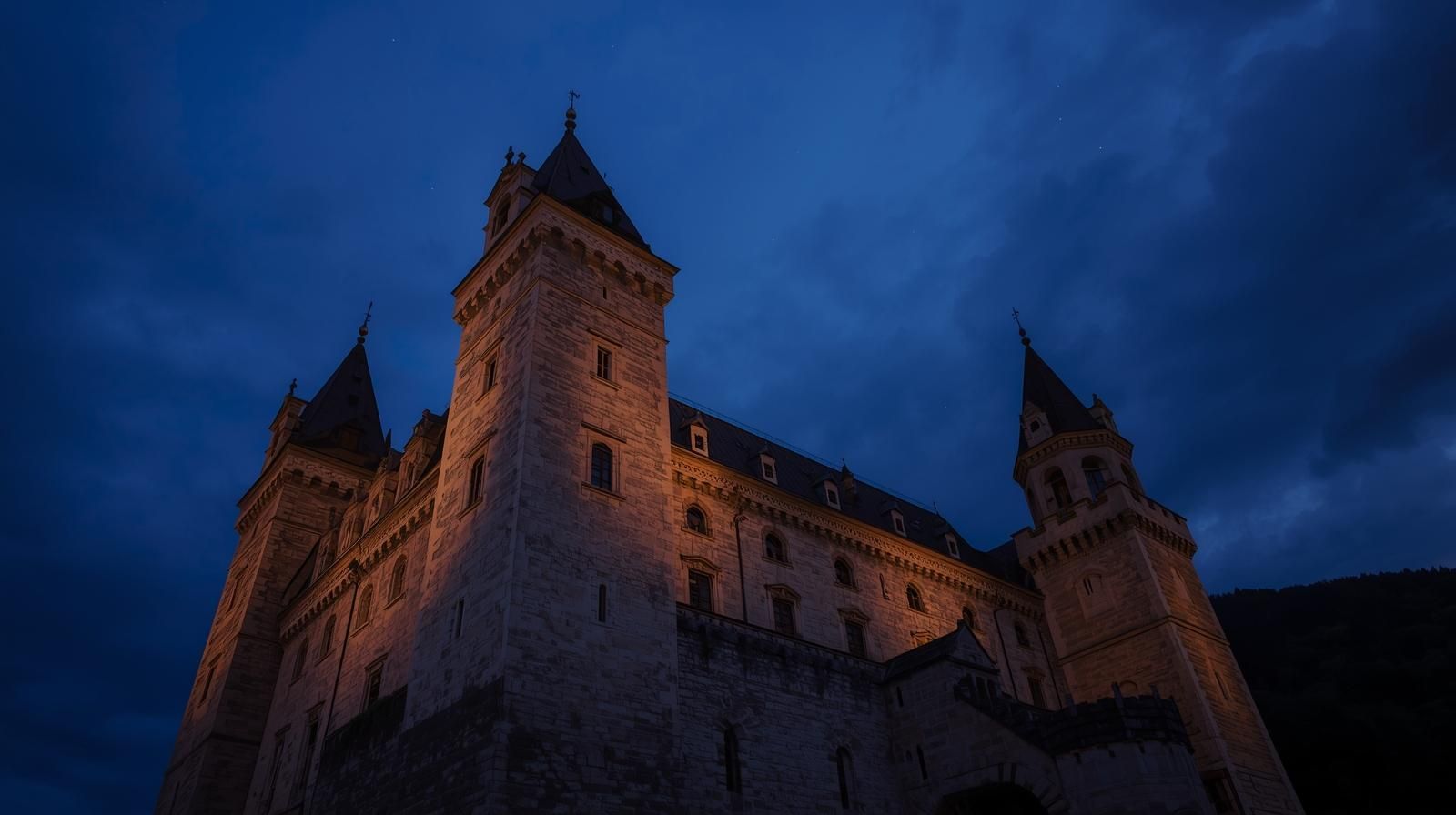 Plassenburg Castle in Bavaria at dusk, home to Germany's White Lady ghost legends and dark folklore