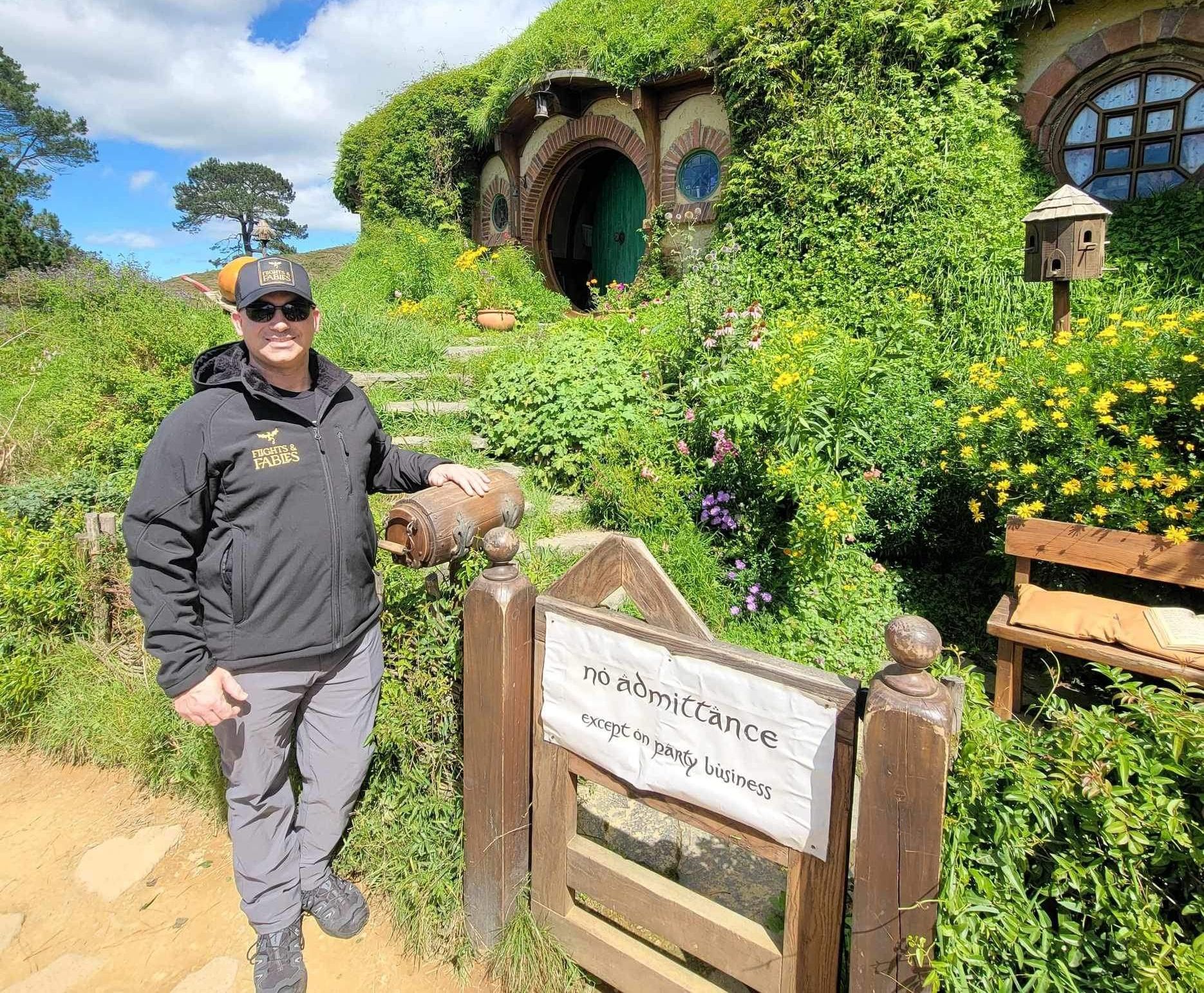 Rocky Dimico at Bag End in Hobbiton Movie Set, Lord of the Rings tour New Zealand travel advisor