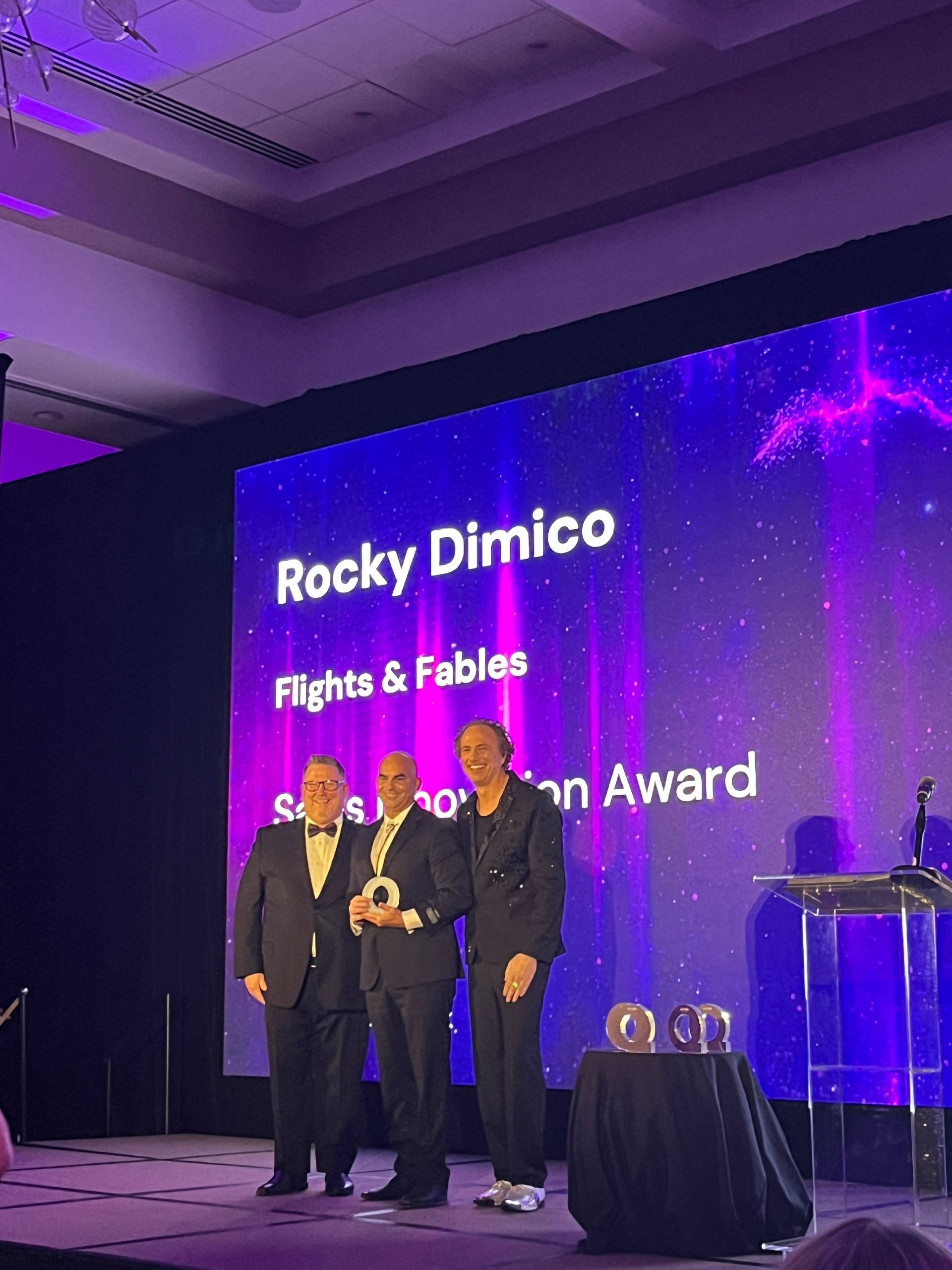 Rocky Dimico receiving the Sales Innovation Award at WORLD25