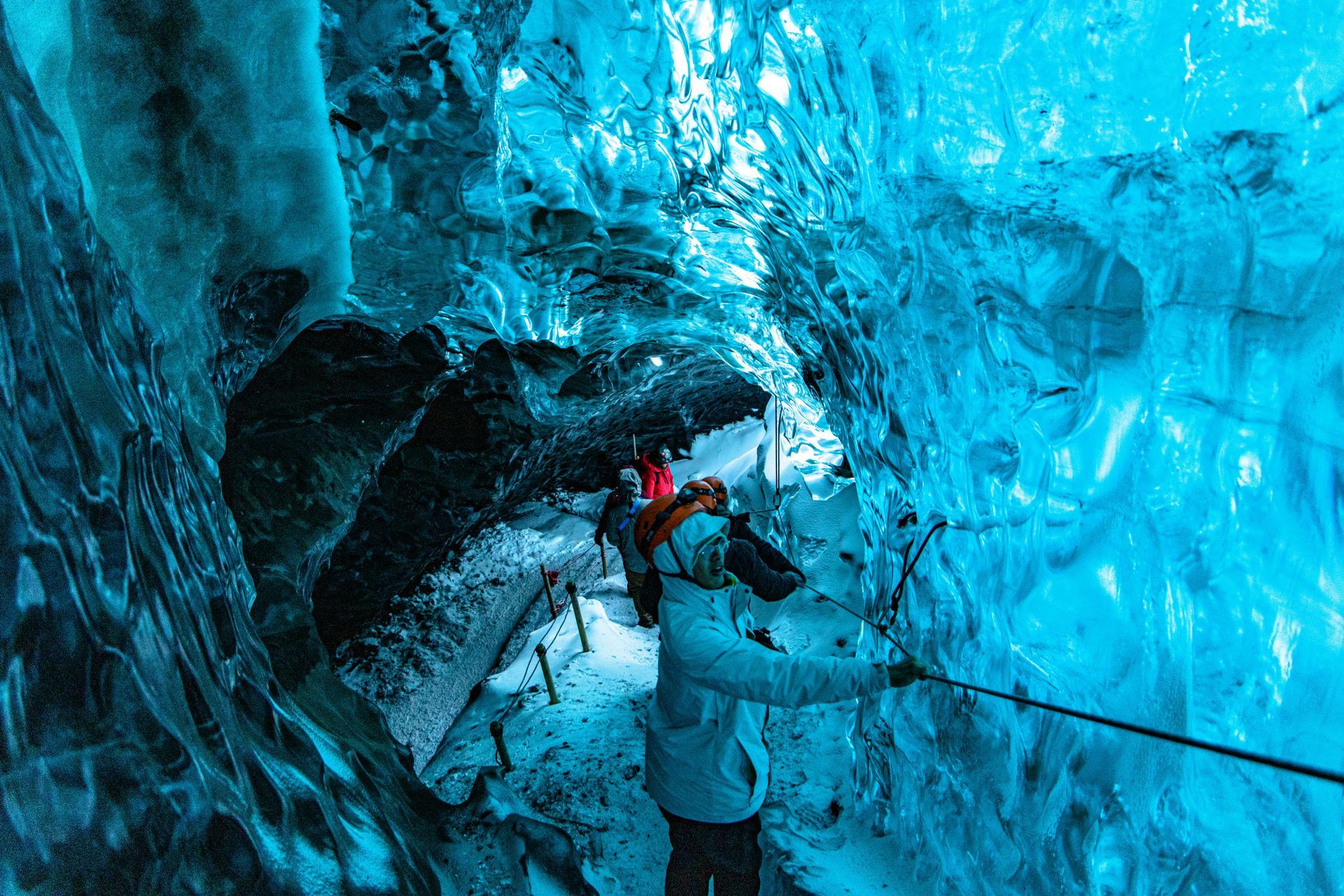 Crystal blue ice cave in Vatnajökull glacier, Iceland's most magical winter fantasy travel destination