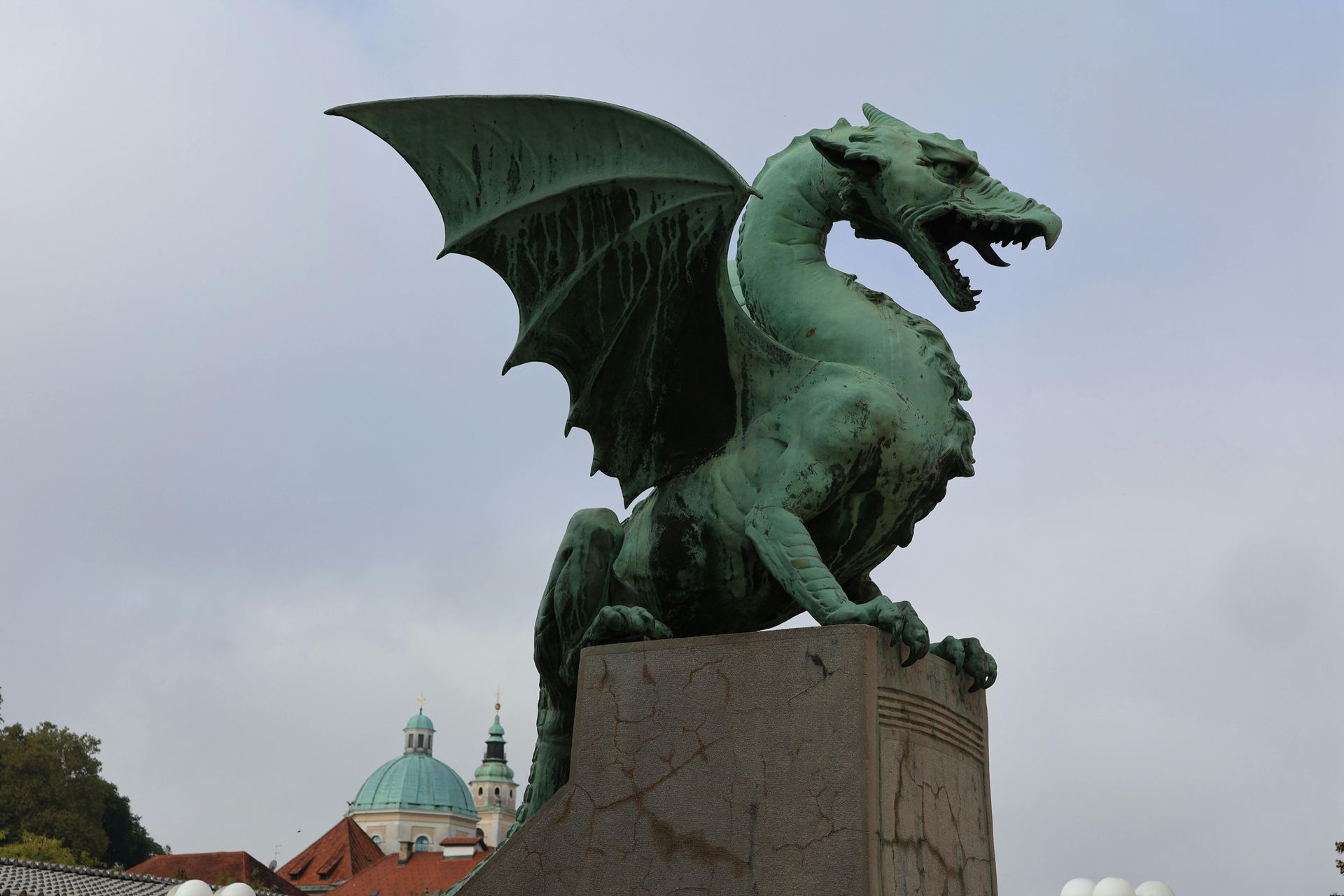 Dragon statue on Dragon Bridge in Ljubljana, Slovenia.