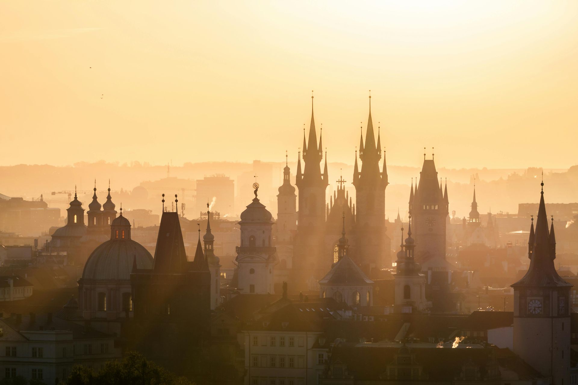 Gothic spires of St. Vitus Cathedral at dusk