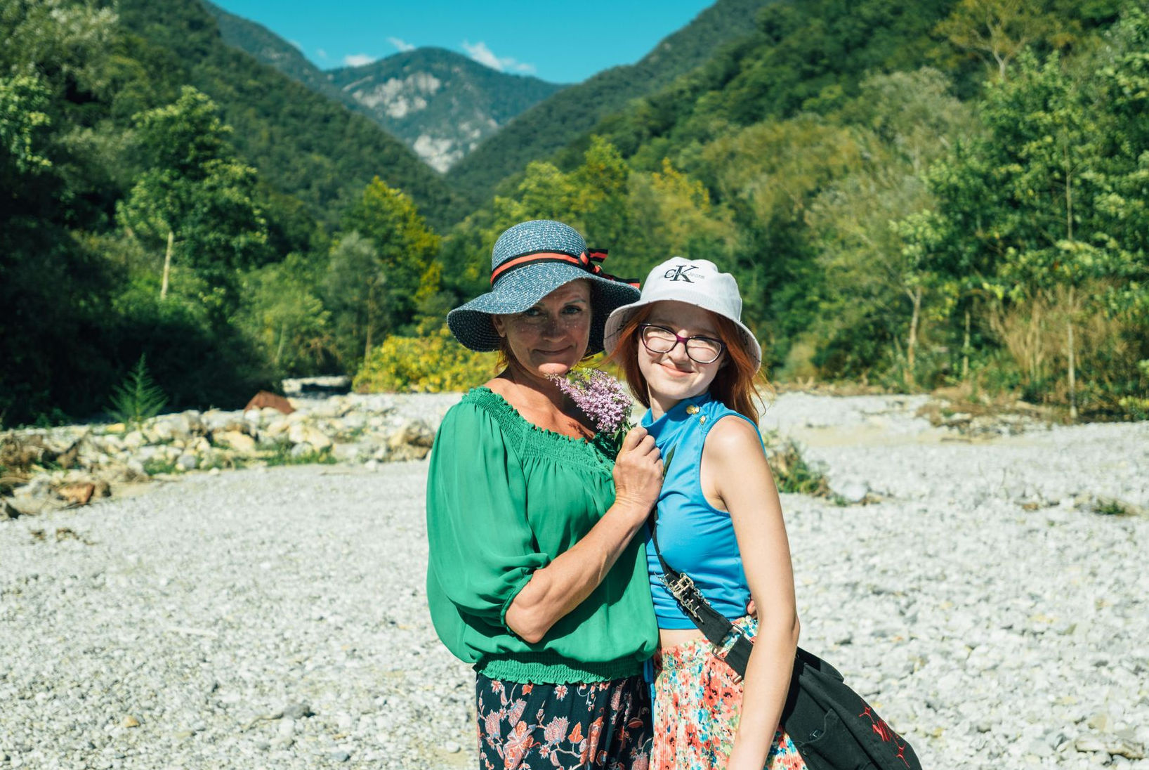 Multigenerational family exploring a mountain town, creating fantasy-inspired memories together.