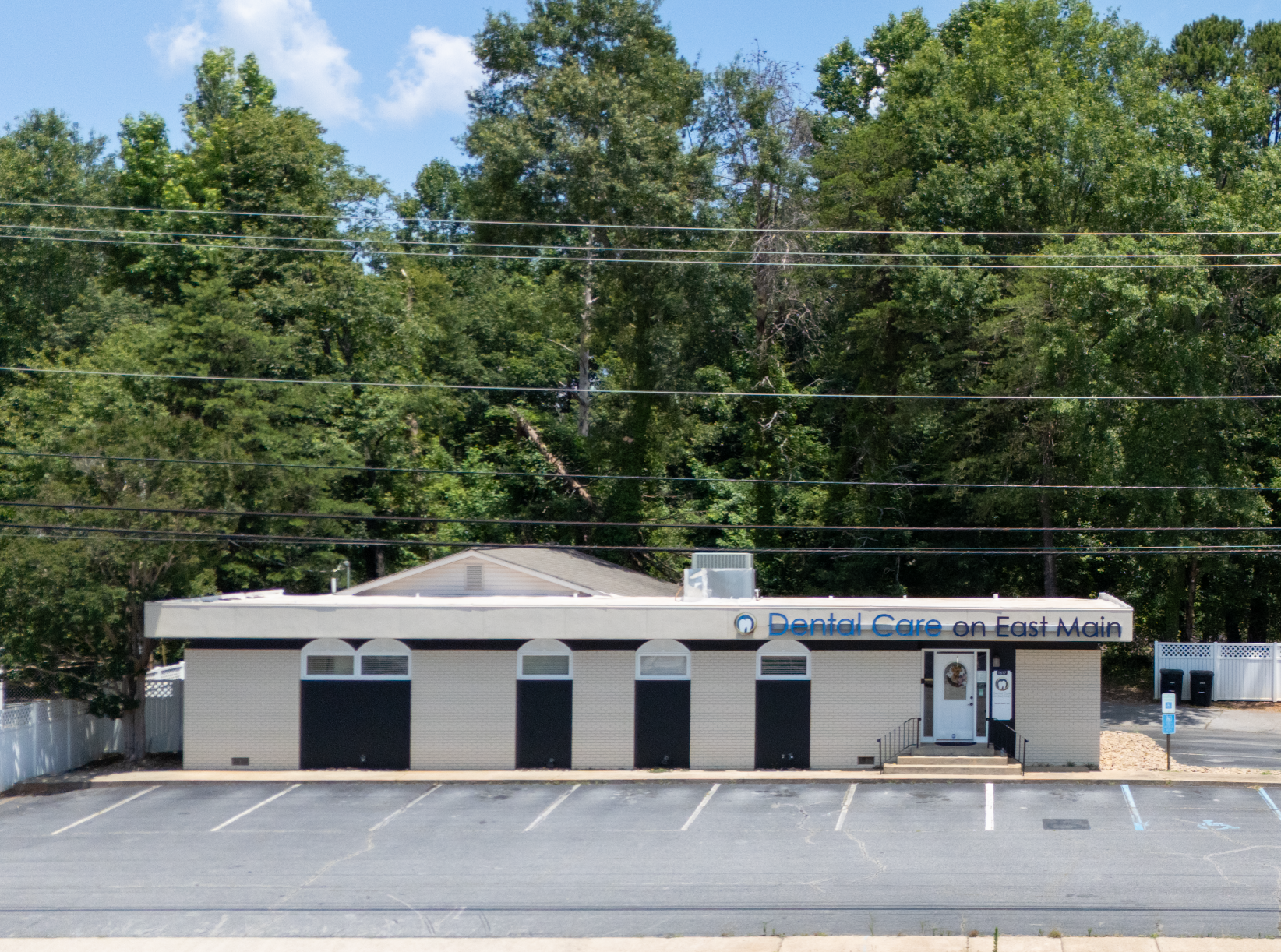 Front angle of the exterior of a heartland dental building in easley
