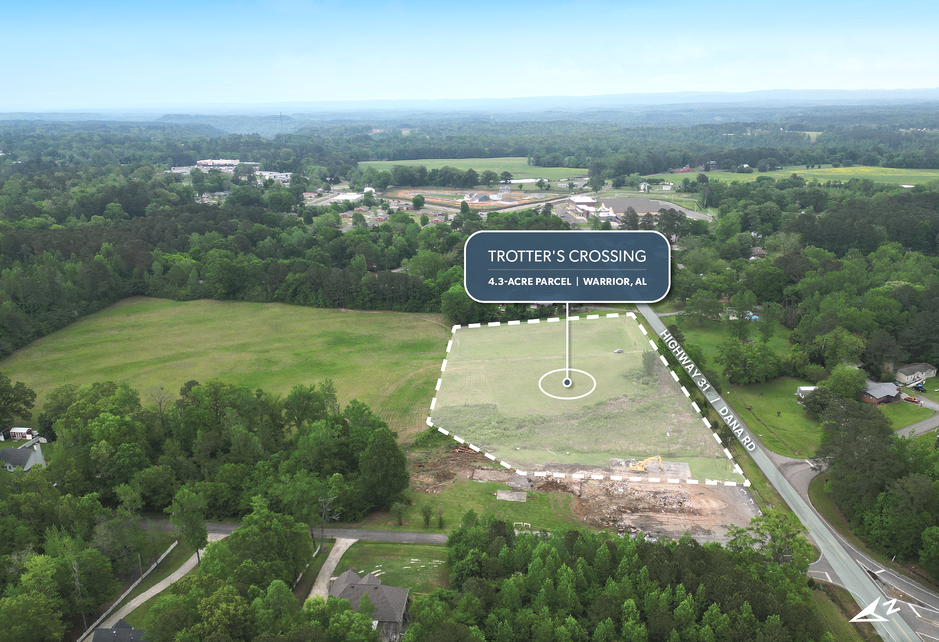 Aerial view of an 4.3-acre undeveloped lot in Warrior, AL next to Interstate-65