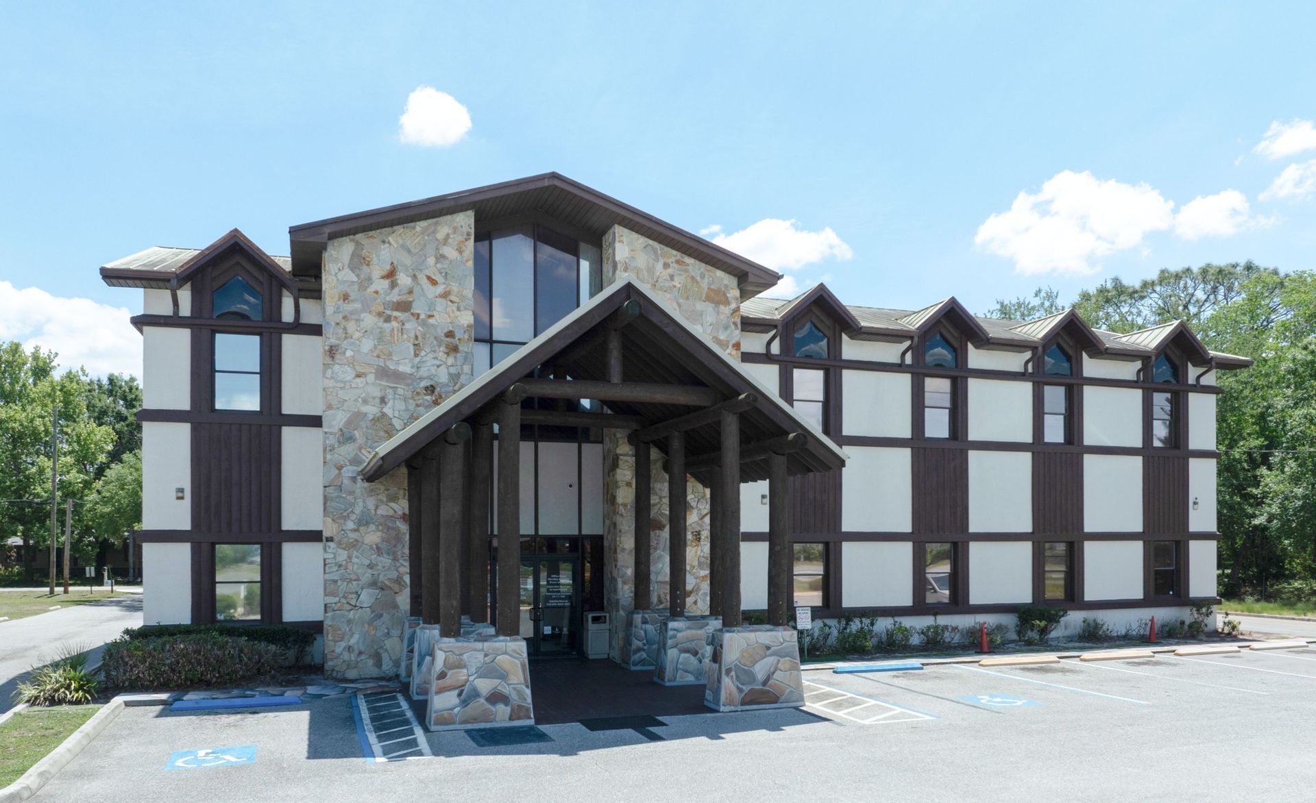 Pediatric Associates building with a covered entrance under a blue sky in Semoran, FL