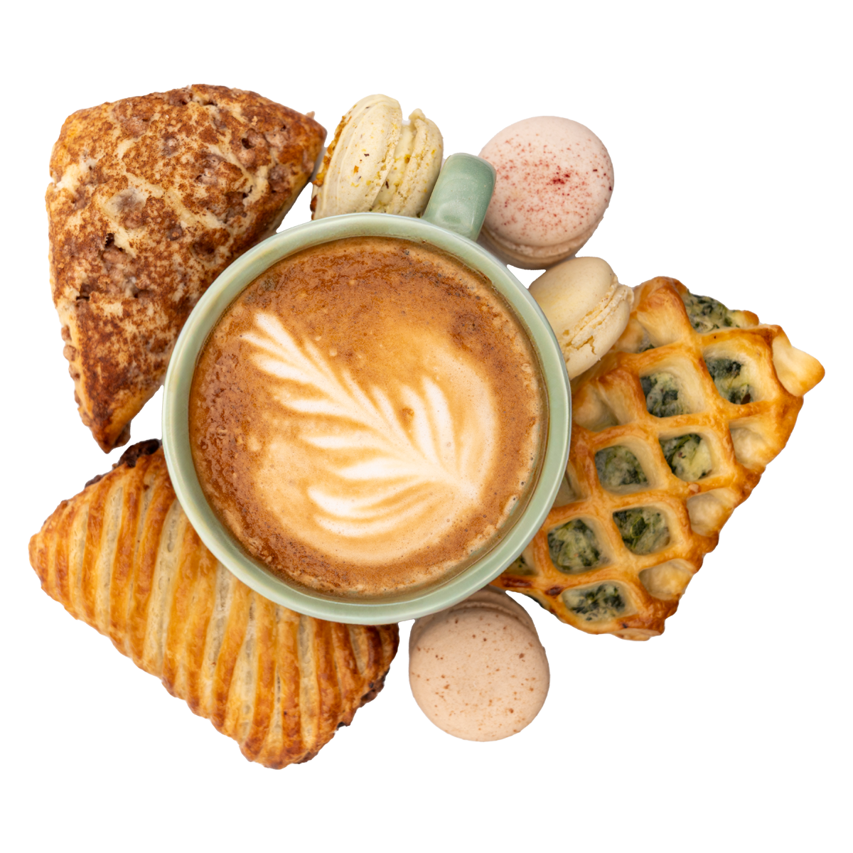 A cup of coffee surrounded by pastries and macarons