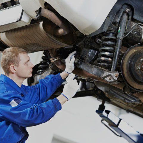 Mechanic checking the car